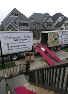 The willamette valley two truck ready to load goods.